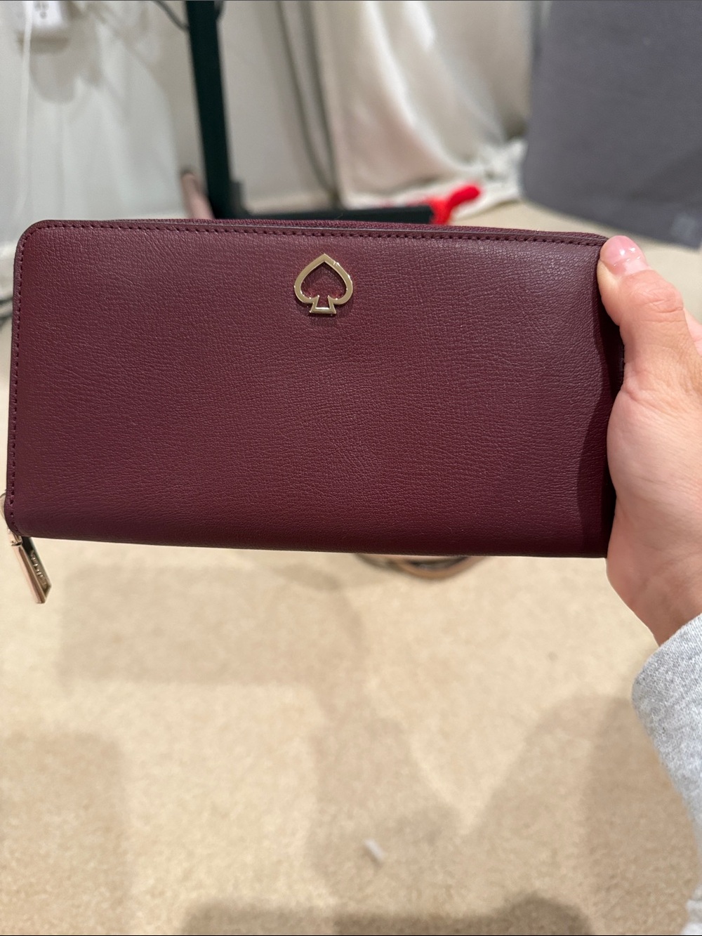 kate spade Burgundy Zip-Around Leather Wallet with Gold Spade